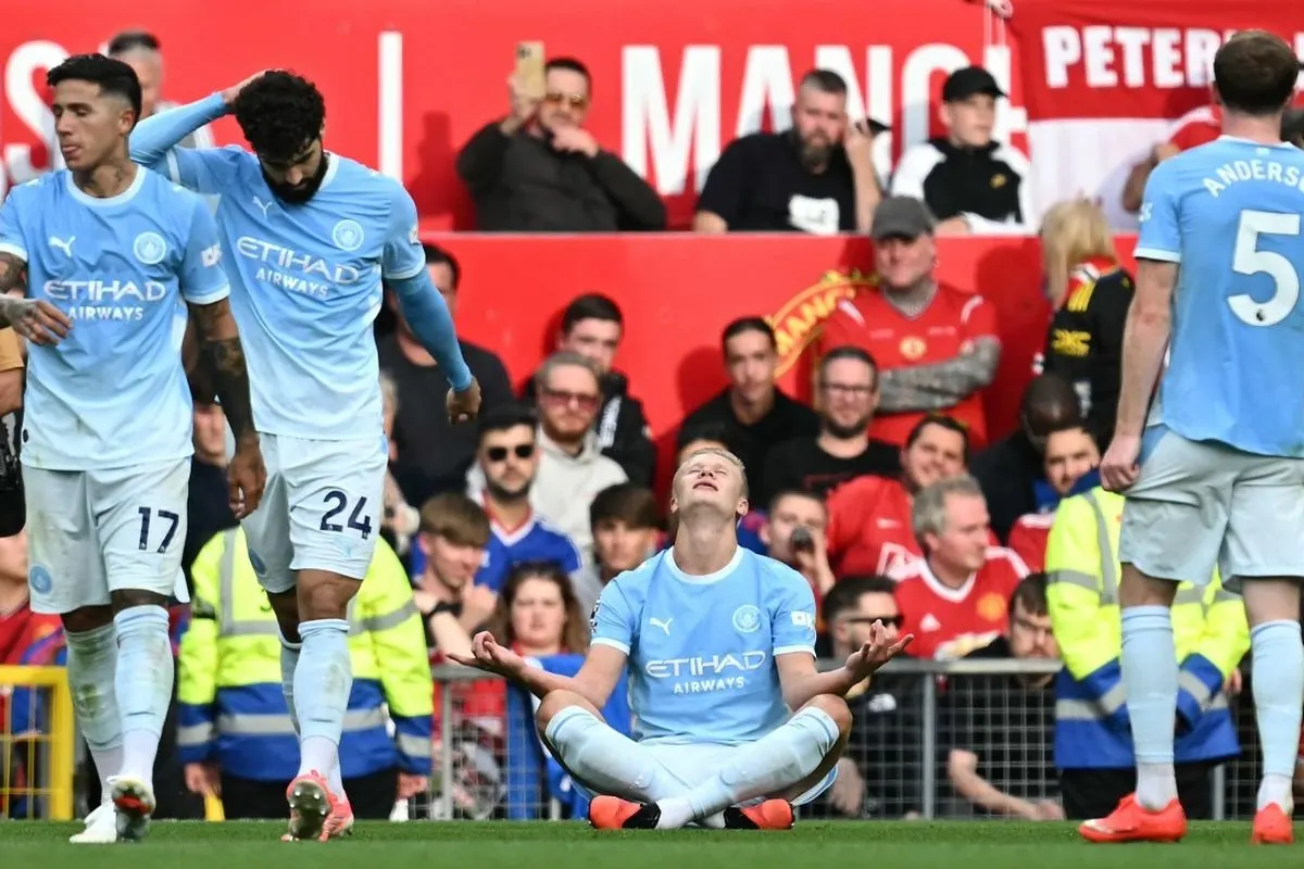 Erling Haaland merayakan gol dalam pertandingan sepak bola Liga Inggris Manchester United vs Manchester City di Old Trafford di Manchester, barat laut Inggris, pada 13 September 2026.